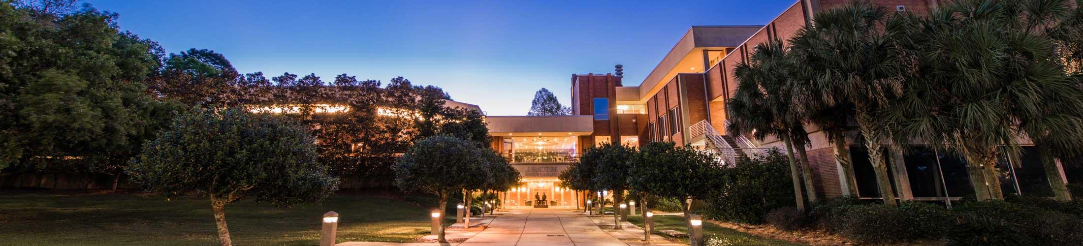 Mitchell College of Business at Night -- Seen as one of the top business schools in Alabama.