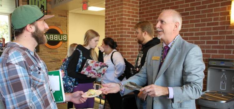 Dr. Michael Capella Meets with Students.